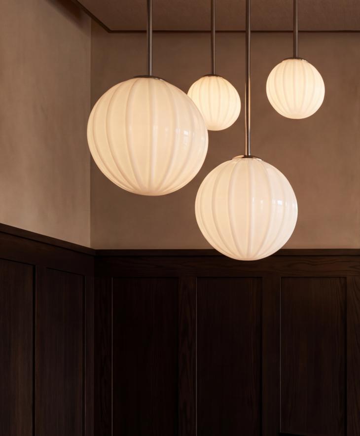 Первая коллаборация Coronet LED с художником: коллекция Artisan Orb для ресторанного и гостиничного освещения